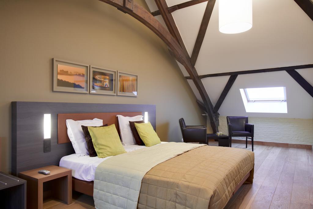 Het Godshuis Hotel Sint-Laureins Bilik gambar
